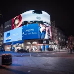 Street giant commercials for Lancôme perfumes and Samsung smartphones